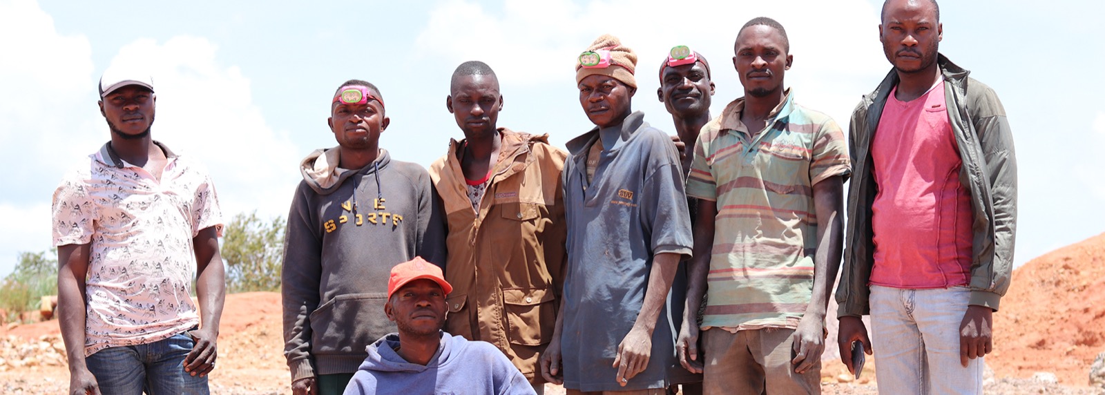 Artisanal miners digging cobalt ore by hand